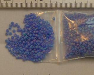 Rocailles 2mm paars-blauw AB. 450 gram.