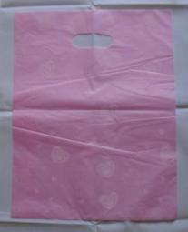 Tasjes 30 x 39 cm roze hartjes. 100 st.