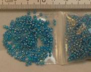 Rocailles 2mm blauw AB. 450 gram.