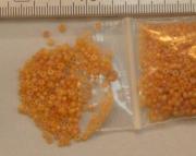 Rocailles 2mm licht oranje. 450 gram.