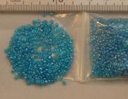 Rocailles 2mm trans. blauw. 450 gram.